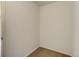 A small, basic closet with neutral carpet at 9737 Canberra Ct, Highlands Ranch, CO 80130