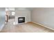 Bright living room with a fireplace and neutral decor at 9737 Canberra Ct, Highlands Ranch, CO 80130