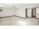 Finished basement with carpeted floor and ceiling fan at 6490 E Dakota Ave, Denver, CO 80224