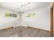 Bright bedroom with hardwood floors and neutral walls at 6490 E Dakota Ave, Denver, CO 80224
