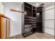 Spacious walk-in closet with ample shelving and drawers at 6490 E Dakota Ave, Denver, CO 80224