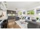 Open concept living room with hardwood floors and modern decor at 6490 E Dakota Ave, Denver, CO 80224