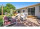 Backyard patio with a hot tub, chairs and a sofa with string lights at 6248 W 75Th, Arvada, CO 80003