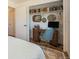 Converted closet to a cozy nook with a desk, chair, and bookshelf at 6248 W 75Th, Arvada, CO 80003