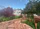 Inviting front yard with stone steps, lush garden beds, and a mix of colorful flowers and greenery at 6248 W 75Th, Arvada, CO 80003