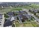 Aerial view of a vibrant neighborhood, showcasing well-maintained homes, green spaces, and streetscapes at 5434 N Xenia St, Denver, CO 80238