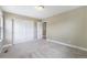 Bedroom features carpeted floors and a double-door closet at 5434 N Xenia St, Denver, CO 80238