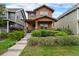 Charming two-story home with a welcoming front porch and meticulously landscaped front yard in a desirable neighborhood at 5434 N Xenia St, Denver, CO 80238