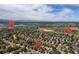 Aerial view of a residential area close to Redstone Park and Mary Gulch Trail at 2587 Foothills Canyon Ct, Highlands Ranch, CO 80129