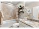 Bright bathroom features granite countertops and a shower and tub combination at 853 Stagecoach Dr, Lafayette, CO 80026
