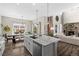 Gourmet kitchen with granite countertops, stainless steel appliances, and a large island perfect for entertaining at 853 Stagecoach Dr, Lafayette, CO 80026