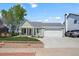 Charming single-Gathering home with a well-manicured lawn and an attached two-car garage in a great neighborhood at 803 W Lucerne Dr, Lafayette, CO 80026