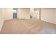 Spacious finished basement with carpet, laundry, and extra room at 1090 Quail Cir, Brighton, CO 80601