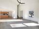 Bright and airy living room with hardwood floors and a view of the kitchen at 1090 Quail Cir, Brighton, CO 80601