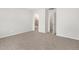 Bedroom featuring a view to an en suite bathroom with a glass enclosed shower at 17424 E 90Th Pl, Commerce City, CO 80022
