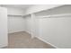 Spacious walk-in closet featuring ample shelving and rod space for optimal organization and storage solutions at 17424 E 90Th Pl, Commerce City, CO 80022