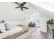 Bright bedroom with ceiling fan, wood-look floors, and access to balcony at 2767 W 38Th Ave, Denver, CO 80211