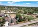 The property's horse arena, outbuildings, house and surrounding rural setting is on full display at 16225 W 74Th Dr, Arvada, CO 80007