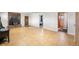 Finished basement showcasing tile floors and doorways to other rooms at 16225 W 74Th Dr, Arvada, CO 80007