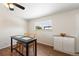 Bright dining area features hardwood floors, table with seating, and a window offering natural light at 16225 W 74Th Dr, Arvada, CO 80007