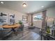 Casual dining area with wood table and seating for four at 21937 E 51St Dr, Aurora, CO 80019