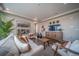 Relaxing living room with neutral decor and a large TV at 21937 E 51St Dr, Aurora, CO 80019