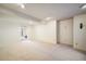 Vast basement area offering versatile space, carpeted floor, and recessed lighting at 247 Regal St, Louisville, CO 80027
