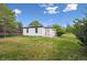 Exterior shot of the home showing backyard area at 11842 W 14Th Ave, Lakewood, CO 80401