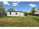 Exterior shot of the home showing backyard area and patio at 11842 W 14Th Ave, Lakewood, CO 80401