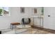 Stylish living room featuring modern decor, white walls, and dark wood flooring at 11842 W 14Th Ave, Lakewood, CO 80401