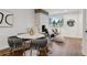 Bright living room features stylish decor, modern seating, and lots of natural light at 11842 W 14Th Ave, Lakewood, CO 80401