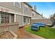 Outdoor patio with stylish seating and lush landscaping, perfect for relaxation and entertaining at 6836 E Briarwood Dr, Centennial, CO 80112
