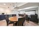 Basement includes wet bar with appliances and home theater seating with projector and screen at 10934 Touchstone Loop, Parker, CO 80134