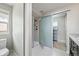 Modern bathroom with a tiled shower, glass door, and modern fixtures at 10934 Touchstone Loop, Parker, CO 80134