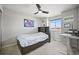 Comfortable bedroom with desk and a window, perfect for a young or guest at 10934 Touchstone Loop, Parker, CO 80134