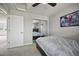 Bedroom featuring a mirrored closet and natural light, great for  at 10934 Touchstone Loop, Parker, CO 80134
