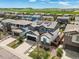 Beautiful home with solar panels, lush landscaping, and well-maintained exterior at 10934 Touchstone Loop, Parker, CO 80134