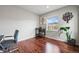 Office with wood floors, and a window overlooking the neighborhood at 10934 Touchstone Loop, Parker, CO 80134