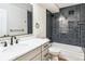 Modern bathroom with stylish gray tiles, quartz counters, and modern hardware at 725 S Alton Way # 9C, Denver, CO 80247