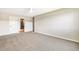 Large bedroom features neutral carpet, ceiling fan, and an adjacent bathroom at 725 S Alton Way # 9C, Denver, CO 80247