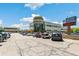 Centerpoint building featuring a restaurant, golf course, and auditorium, with ample parking and a well-maintained exterior at 725 S Alton Way # 9C, Denver, CO 80247
