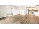 Spacious living area with hardwood floors, plenty of natural light, and access to additional rooms at 725 S Alton Way # 9C, Denver, CO 80247