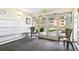 Comfortable lobby area with seating, mailboxes, and a view to the outdoors at 725 S Alton Way # 9C, Denver, CO 80247