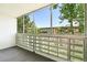 Enclosed patio space featuring brick lattice and views of the community at 725 S Alton Way # 9C, Denver, CO 80247