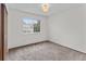 Empty bedroom featuring natural light and closet at 8441 S Timberwood St, Highlands Ranch, CO 80126