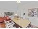 Cozy dining area with natural light and open access to the living area at 8441 S Timberwood St, Highlands Ranch, CO 80126