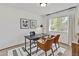 Bright office with a modern desk, stylish chairs, and ample natural light at 8441 S Timberwood St, Highlands Ranch, CO 80126