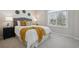 Comfortable bedroom with a large window and stylish decor at 5667 W 109Th Cir, Westminster, CO 80020