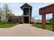 The exterior of the fitness center is red brick with glass doors in front of a courtyard entrance at 5667 W 109Th Cir, Westminster, CO 80020