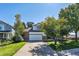 Well-maintained two-story house with a brick-accented facade, a two-car garage, and a lush front yard at 5667 W 109Th Cir, Westminster, CO 80020